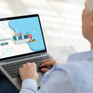 Senior Woman Study Online With Laptop At Home, Sign-Up On Educational Website